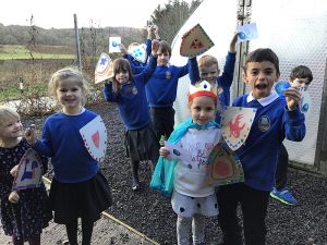 Children holding shields