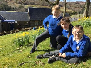 Pupils outside in school uniform